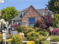 HANDSOME TUDOR REVIVAL-STYLE HOME