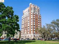 GRACIOUS LIVING IN THIS ELEGANT CONDO WITH SWEEPING VIEWS OF THE BAY AREA AND THE LAKE