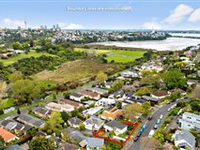 PRIVATE TWO-LEVEL FAMILY HOME IN COVETED LOCATION