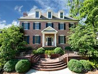 ELEGANT BRICK GEORGIAN ON MANICURED PRIVATE LOT