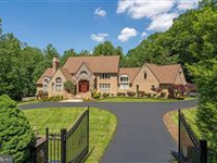 STUNNING BRICK TUDOR WITH EXQUISITE DETAILS