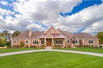 SPECTACULAR CUSTOM HOME ON A SCENIC LOT IN BEAUTIFUL ROSE OF SHARON ESTATES