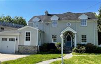 MAGNIFICENT THREE-LEVEL COLONIAL STYLE HOME
