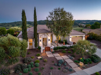 ELEGANT AND EXQUISITELY UPDATED TUSCAN STYLE HOME