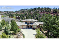 STUNNING CUSTOM DESIGNED HOME IN GATED COMMUNITY