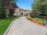 YOUNG BRICK COLONIAL WITH OPEN FLOOR PLAN IN PRESTIGIOUS NORTH CLIFFS