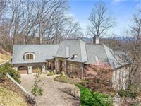 EXQUISITE CUSTOM BUILT HOME WITH SPECTACULAR MOUNTAIN VIEWS
