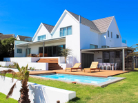 BEAUTIFUL NEWLY RENOVATED FIVE BEDROOM CANAL HOME