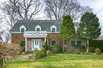 GORGEOUS CONTEMPORARY BRICK CENTER HALL COLONIAL