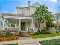 BEAUTIFUL CORNER LOT HOME WITH CHARMING ARCHITECTURE