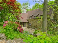 ELEGANT 1930'S MEDIEVEL REVIVAL HOME WITH BEAUTIFUL LANDSCAPED YARD