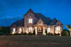 CUSTOM HOME IN PRESTIGIOUS GATED COMMUNITY