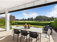 HAMPTONS-STYLE HOME WITH GOLF COURSE AND WATER VIEWS