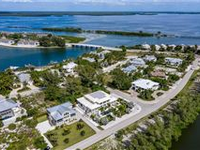 LOVELY NORTH SHORE HOME WITH GORGEOUS VIEWS OF LAKE GASPARILLA