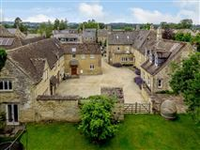 HANDSOME PERIOD PROPERTY WITH COTTAGES IN SOUGHT-AFTER COTSWOLDS VILLAGE