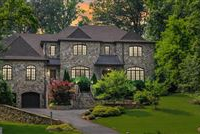 FOUR-SIDED STONE RESIDENCE ON A GORGEOUS LOT