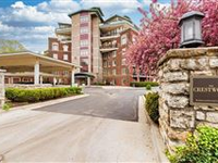 ELEGANT CRESTWOOD CONDO WITH EXPANSIVE PRIVATE BALCONY