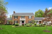 BEAUTIFUL BRICK HOME ON A STUNNING HALF ACRE LAND