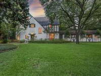 CHARMING TUDOR JEWEL WITH PICTURESQUE BACKYARD AND POOL