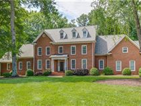 REMARKABLE HOME IN DESIRABLE RIVER ROAD CORRIDOR