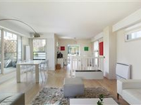 THIS TRIPLEX APARTMENT WITH THE FEEL OF A PRIVATE HOUSE IS IN A LUXURIOUS RECENT RESIDENCE