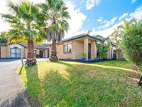 TRADITIONAL FAMILY HOME WITH GREAT CURB APPEAL
