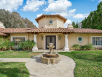 A TRUE ESTATE SET ON TWO ACRES