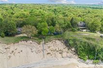 PRISTINE BEACHFRONT HOME WITH SWEEPING LAKE VIEWS
