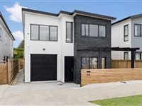 AN EXQUISITELY CRAFTED BRAND-NEW HOME