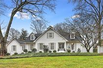 THIS TASTEFULLY UPDATED HOME OFFERS CHARMING CURB APPEAL