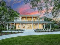 THIS EXCEPTIONAL COASTAL SOUTHERN INSPIRED RESIDENCE IN LANDFALL IS SITUATED ON A PREMIER LOT