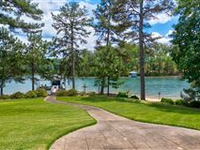 CUSTOM HOME ON PERFECTLY SLOPED LOT