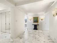 SUN-FLOODED SOUTH-FACING PENTHOUSE WITH OUTDOOR SPACE ON FIFTH AVENUE