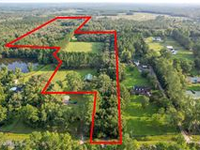 PRIVATE GATED RANCH ON 10 MANICURED ACRES WITH BARN