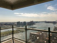 SURROUNDED BY THE WATER AND THE PANORAMA OF MANHATTAN