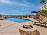 MAGNIFICENT AND UPGRADED RANCH HOME WITH PANORAMIC VIEWS