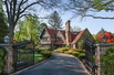MAGNIFICENT ARCHITECT-DEISGNED TUDOR HOME WITH MODERN AMENITIES