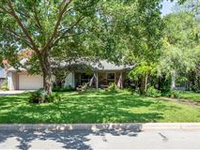OLD-WORLD CHARM ON OVER HALF AN ACRE IN THE HEART OF FORT WORTH