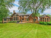 ONE OF A KIND STUNNING HOME WITH PRIVATE LAKE VIEWS