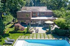 MAGNIFICENT SOUTH FACING STONE AND BRICK COLONIAL