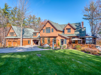 CUSTOM-BUILT HOME WITH CAPTIVATING VIEWS OF SQUAM LAKE
