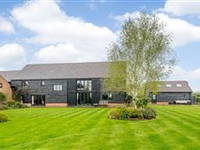 OLD BARN HOUSE IS AN IMPRESSIVE PROPERTY SET IN APPROXIMATELY ONE ACRE