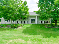 STATELY BUNGALOW ON ALMOST SEVEN ACRES