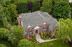 ELEGANT LIVING IN TUDOR-STYLE FAMILY HOME