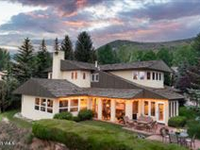 BRIGHT AND SUNNY SINGLE FAMILY HOME WITH PANORAMIC MOUNTAIN VISTAS