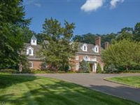 STUNNING ALL-BRICK GEORGIAN COLONIAL ON HISTORIC KENILWOOD GROUNDS