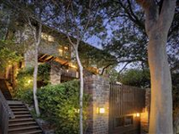 CHARMING BRICK HOME IN PEACEFUL SETTING