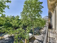 BRIGHT SECOND FLOOR APARTMENT WITH CONTINUOUS BALCONY