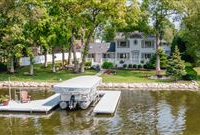 LUXURY LAKE HOME WITH STUNNING DETAILS AND FINISHES THROUGHOUT