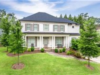 CHARMING UPSCALE FAMILY HOME WITH LUXURY AMENITIES
